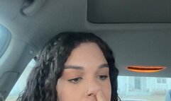 Picking my nose and searching for boogers in the car