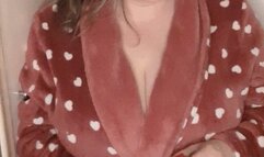 Erotic smoking on a robe, panties and bra, cork cigarette