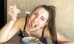 Appetizingly eating delicious ice cream