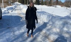 girl in high-heeled shoes and straps climbs an ice slide, falls and twists her foot, now she can’t walk