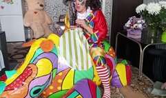 clown ride on rhino inflatable and play with foil balloons