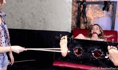 Bastinado and hot wax punishment of the wonderful Margarita's stocked feet from cruel mistress Lyana (Part 5 of 6)