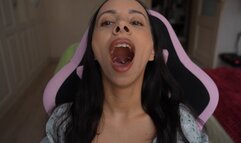 I show my hot uvula and long tongue sititng on gaming chair