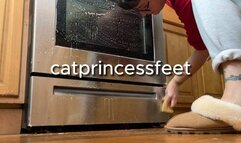 Housewife in furry slippers and sweatpants cleaning oven, size 9 milf