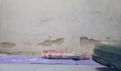 Worker stomping Cake