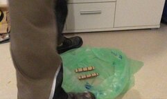 Worker stomping some Food with Work Boots