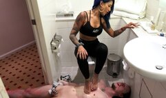 Goddess Penelope tramples on Her lazy human bath mat