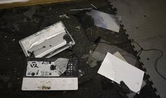 Laptop crushing with black metal heel metal tipped stiletto high heels