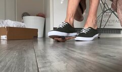 Giantess in sneakers finds tiny man in her shoe