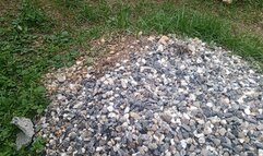 Stehing with my feet a mountain of small stones (3)