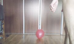 Male looner Sit to Pop Red Balloon