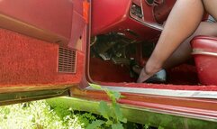 Sexy black nylons and black heals revving the relentless old ford!