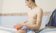 Male Looner is Blowing Up an Inflatable Ice Pop