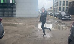 girl in high-heeled shoes with open toes like to pressing pedals in car with her high heels