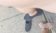 Mister squeezing Tempest's calf while walking