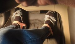 Fifi cranking her sedan in sandals with black socks replay
