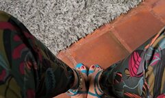 Milah Arches tantalizing dangling on sexy blue sandals