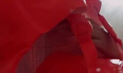 Alla inflates an inflatable swimming vest with her mouth