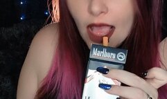 Smoking a Marlboro100 in a slutty dress