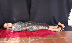 Many tickles on the feet and body to woman completely wrapped (3)