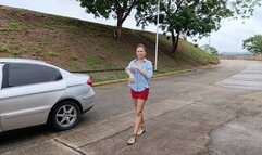 Katherine struggling with her driving lessons in sandals