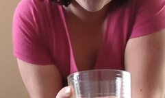 Kristy Coughs, spits in glass cup