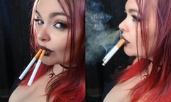 Smoking two Marlboro 100's side profile