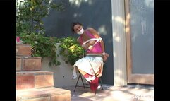 Pretty Gia Mancini Sits Tied And Gagged Topless Among The Flowers!