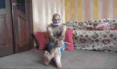 tied up sitting on the floor b