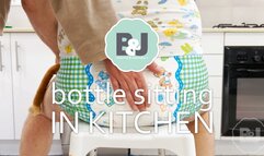 Bottle sitting on kitchen