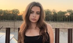 Smoking a cork cigarette in my long black dress before I go out for dinner!