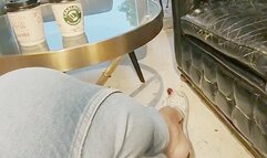 Sandals gently rocking from Angeline's feet while touching a coffee in a bar (1)