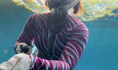 Zebra dive suit in the spring with deep cleavage view and legs on display part two