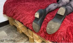 Slave's licking nasty street dirt from soles of My ankle boots after the concert and hands trampling