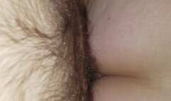 Riding reverse cowgirl