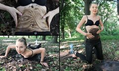 Nastya is having fun and covers her tummy with mud